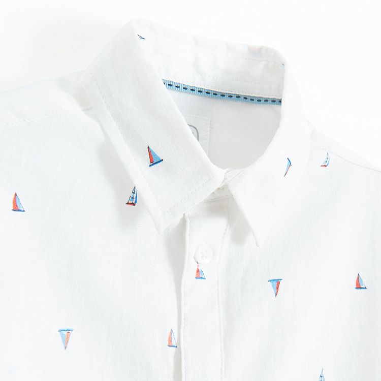 White short sleeve button down shirt with small boats print