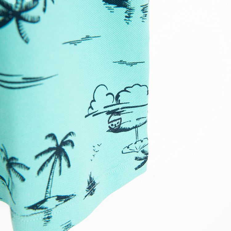 Blue polo T-shirt with palm trees print