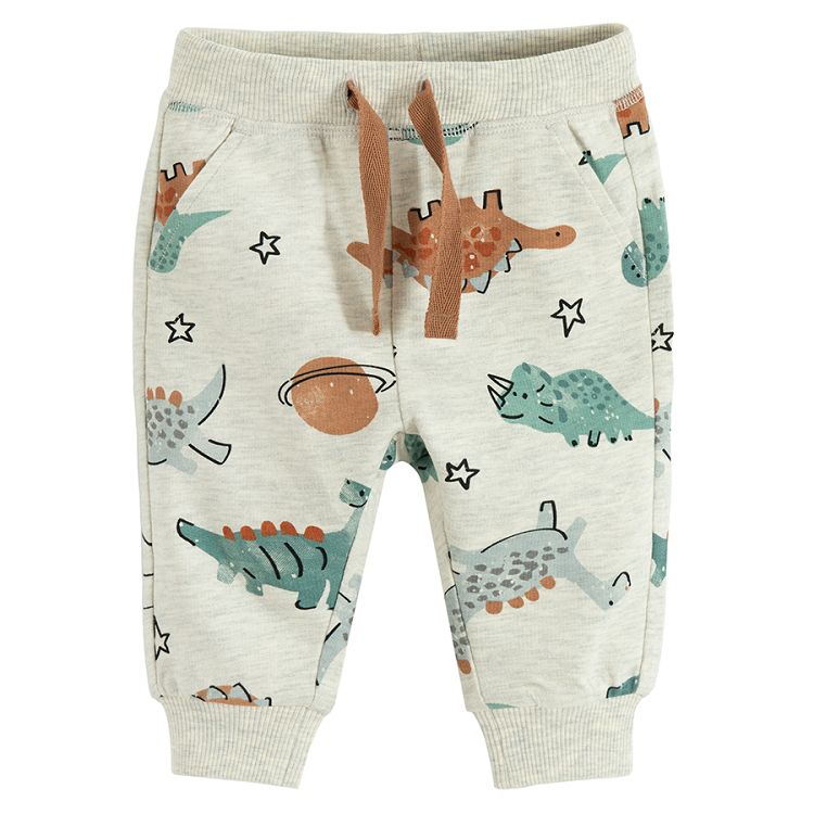 Ecru jogging pants with dinosaurs and planets print