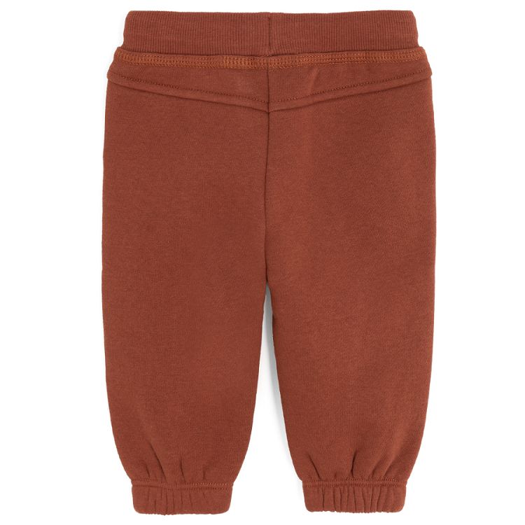 Brown jogging pants with bear print