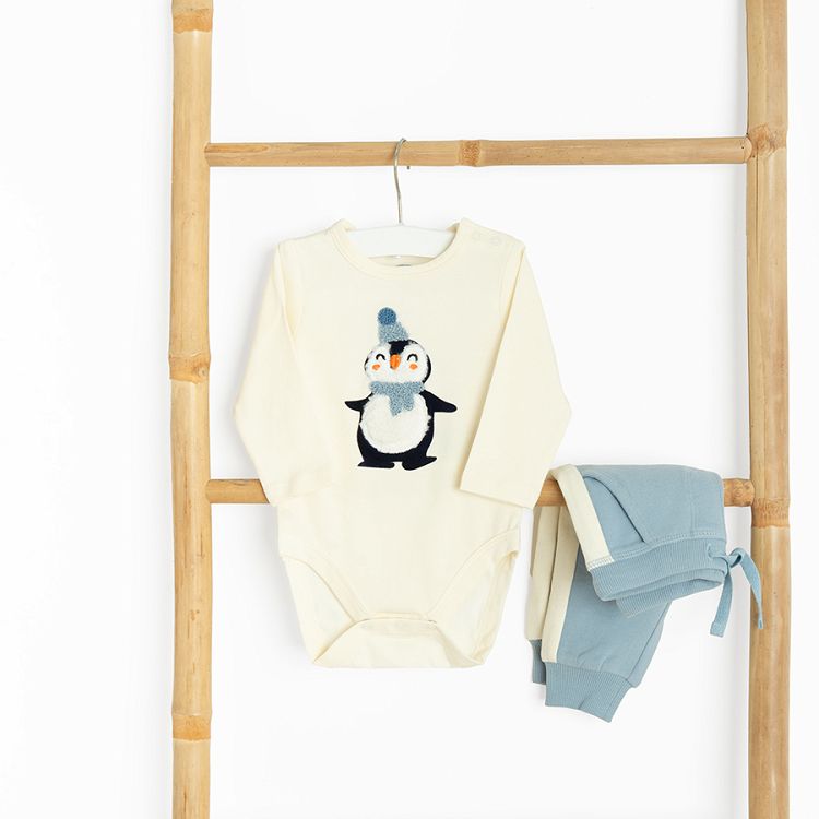 Ecru long sleeve bodysuit with festive penguin and blue jogging pants set- 2 pieces