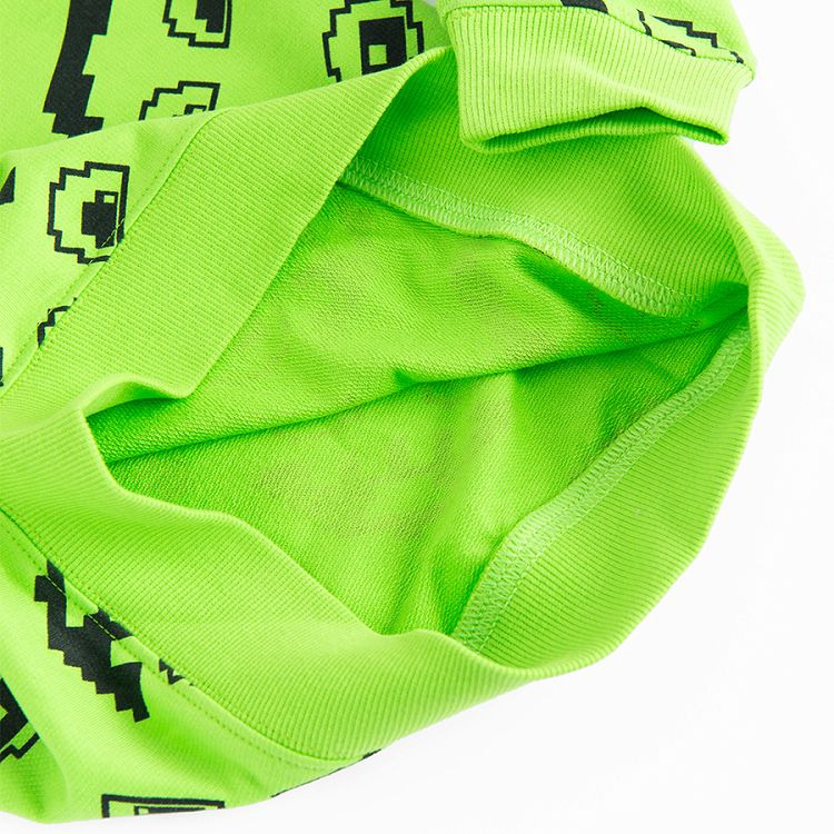 Lime sweatshirt with funny faces print