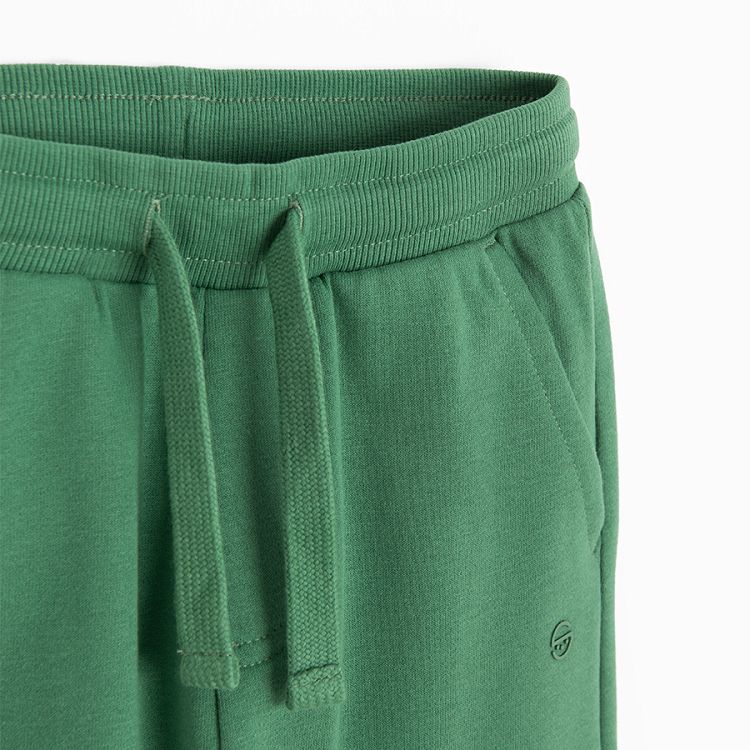 Green jogging pants