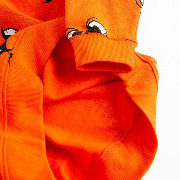 Orange sweatshirt with eyes print