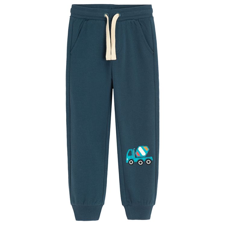 Blue jogging pants with cement mixer print