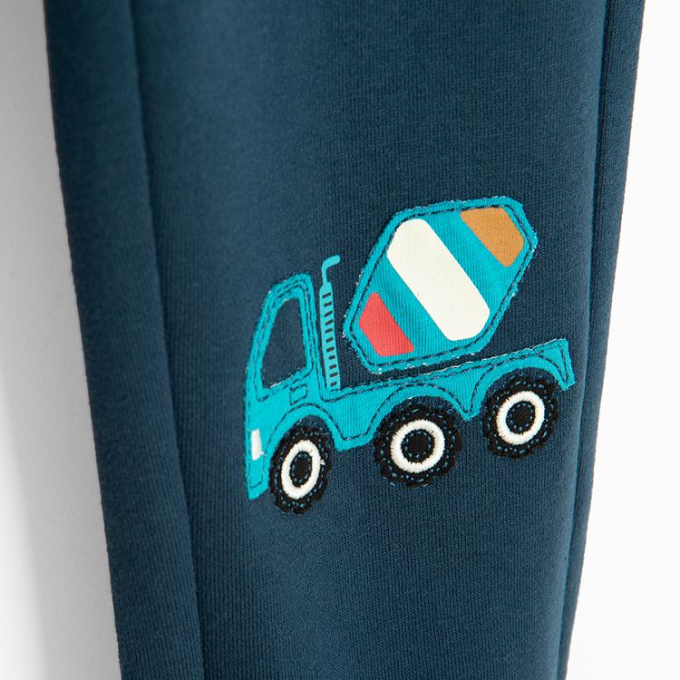 Blue jogging pants with cement mixer print