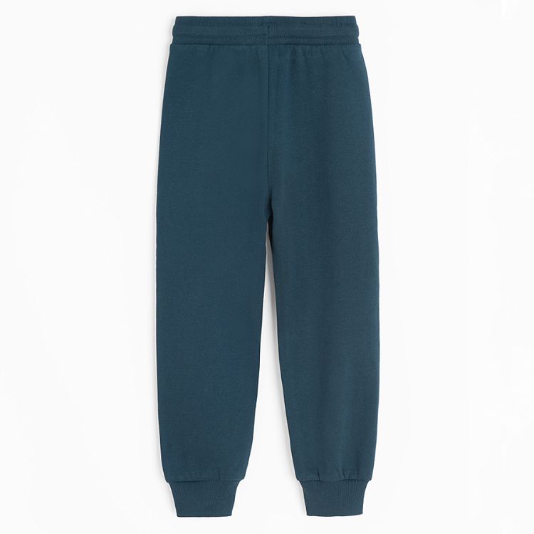 Blue jogging pants with cement mixer print