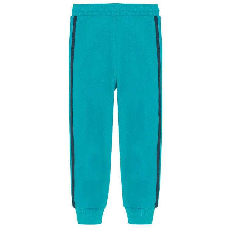 Light blue jogging pants with side stripes