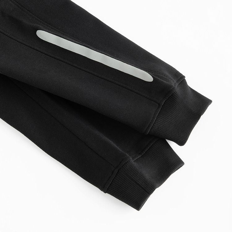 Black jogging apnts with silver stripe