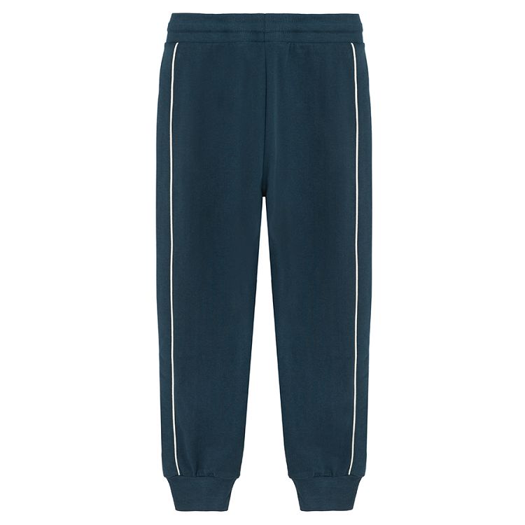 Blue jogging pants with white stripe