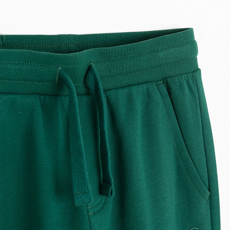 Green jogging pants