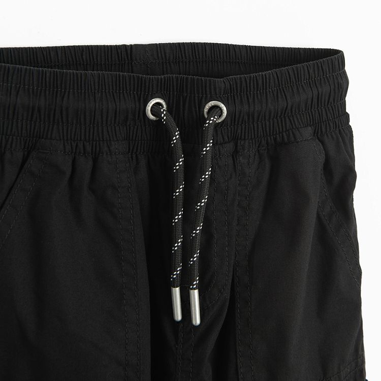 Black cargo trousers with side pockets