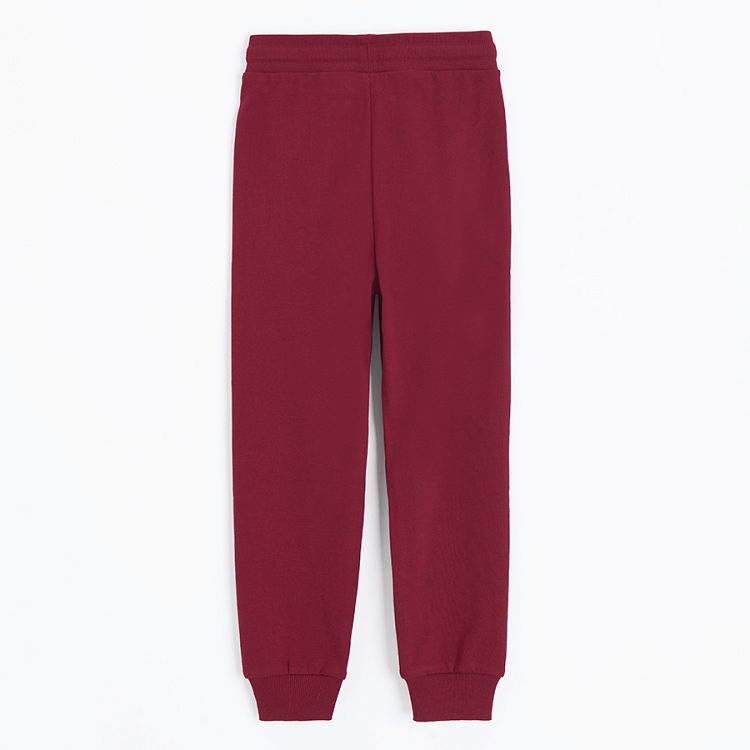 Red sweatpants with cord