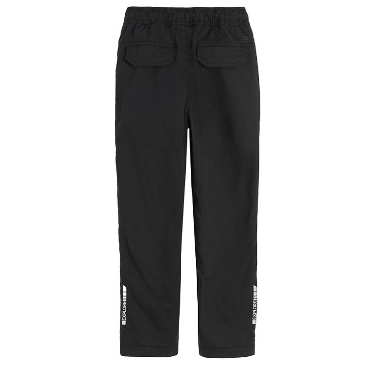 Black trousers with side pockets