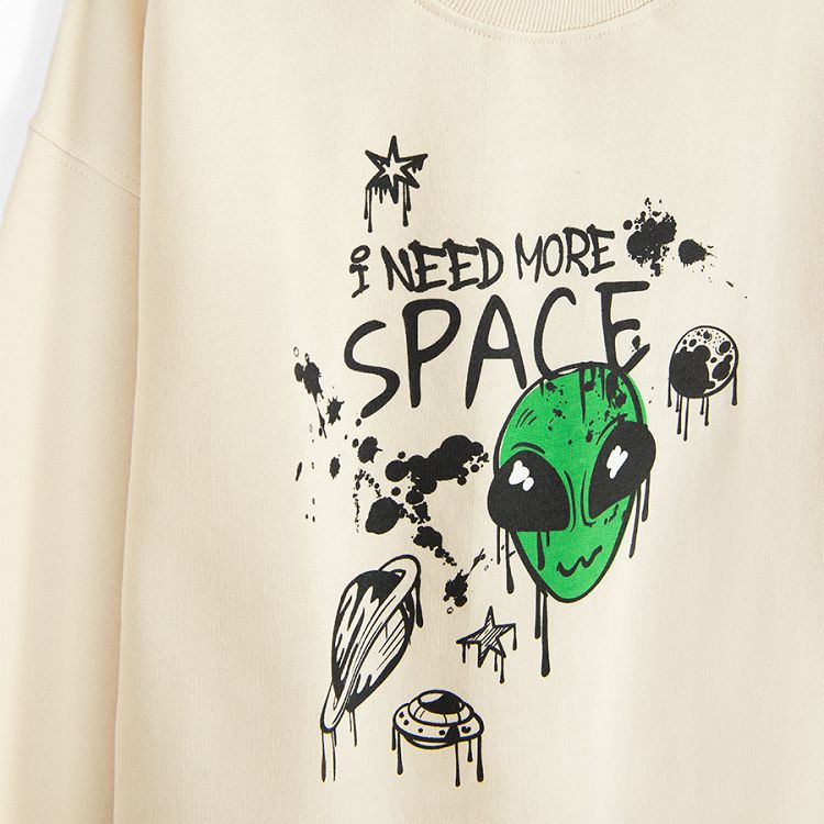 White sweatshirt with I NEED MORE SPACE print