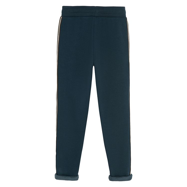 Blue jogging pants with side stripes