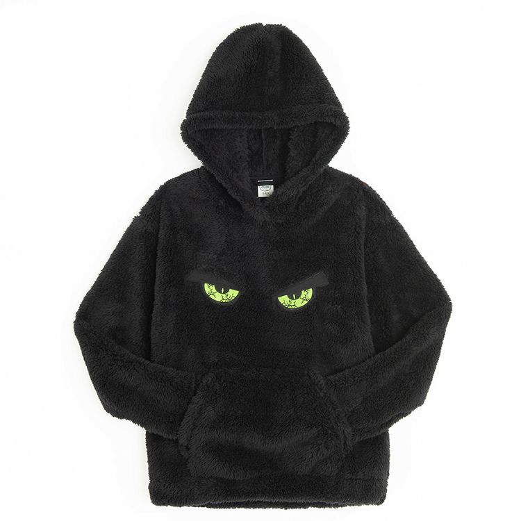 Black sweatshirt with Halloween green scary eyes print