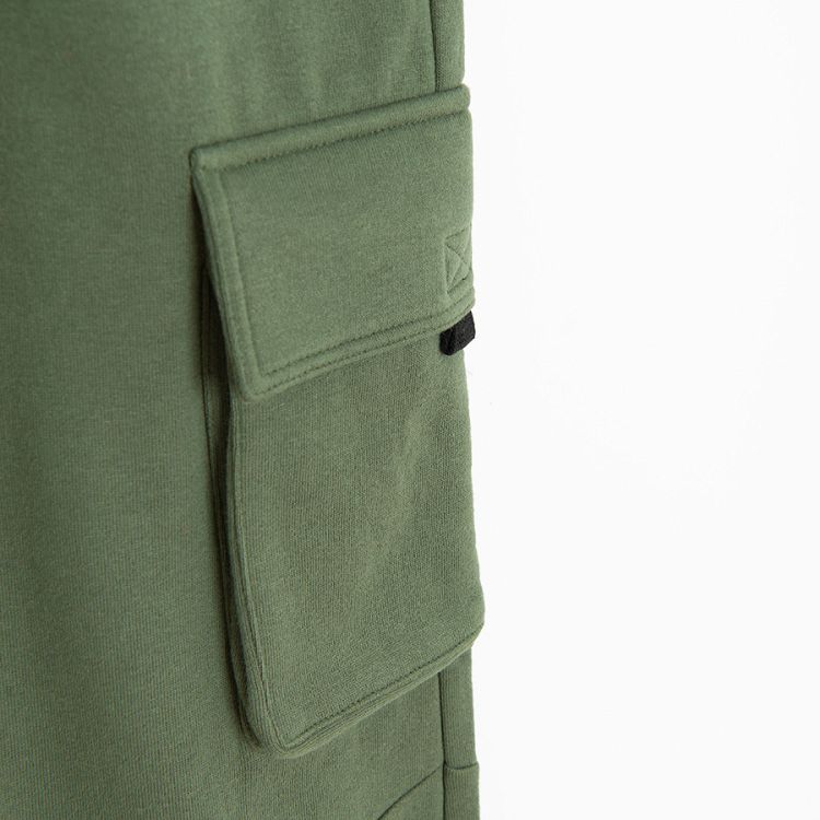 Khaki jogging pants with external side pockets