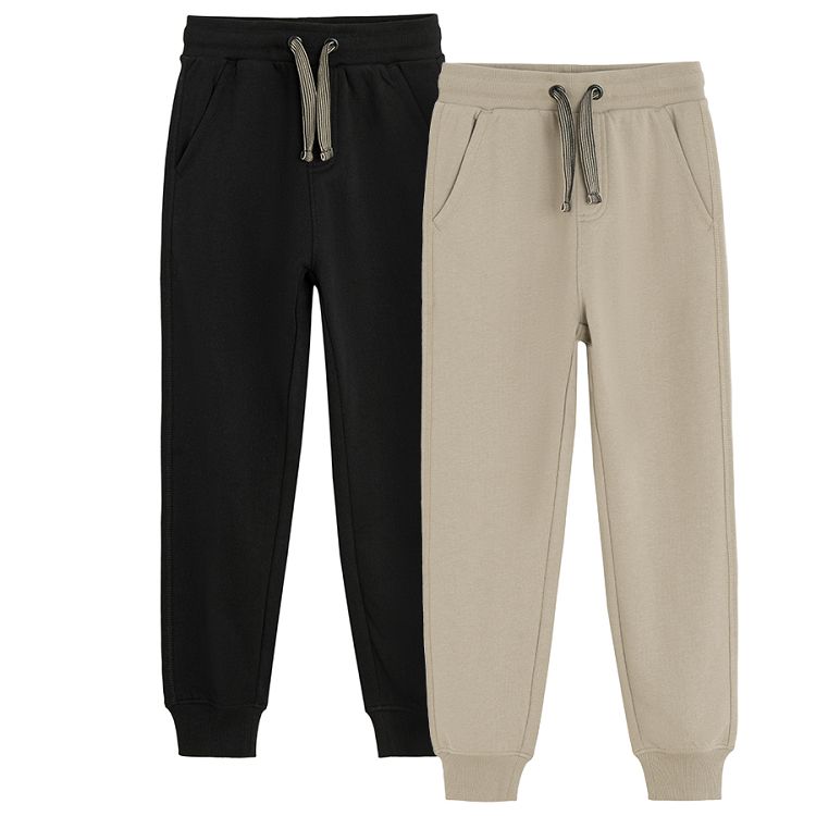 Grey and black jogging pants with side stripe