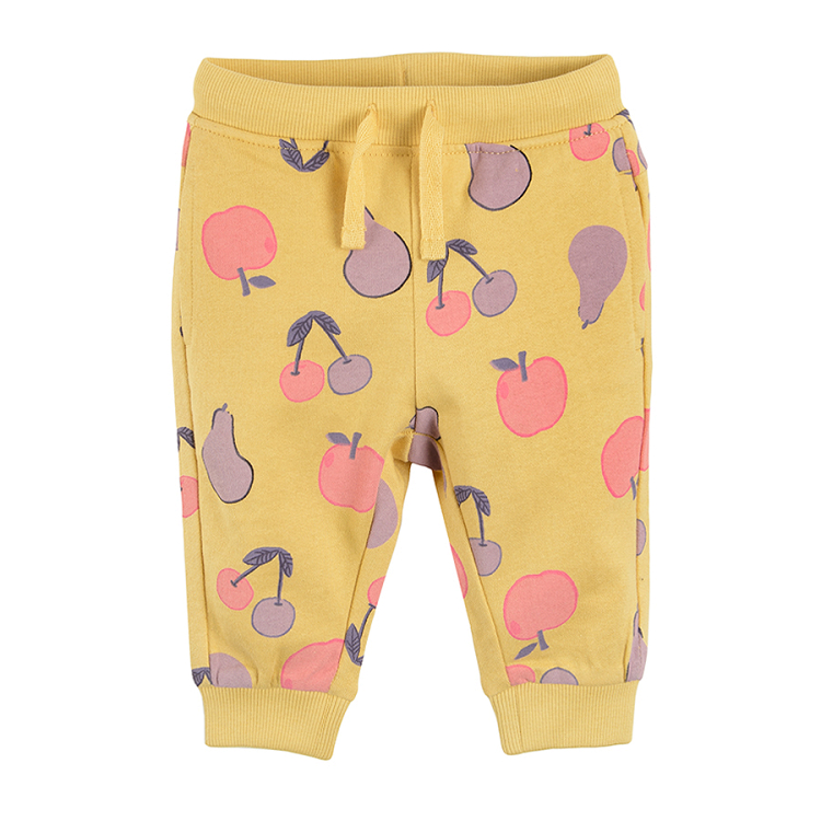 Yellow jogging pants with fruit print