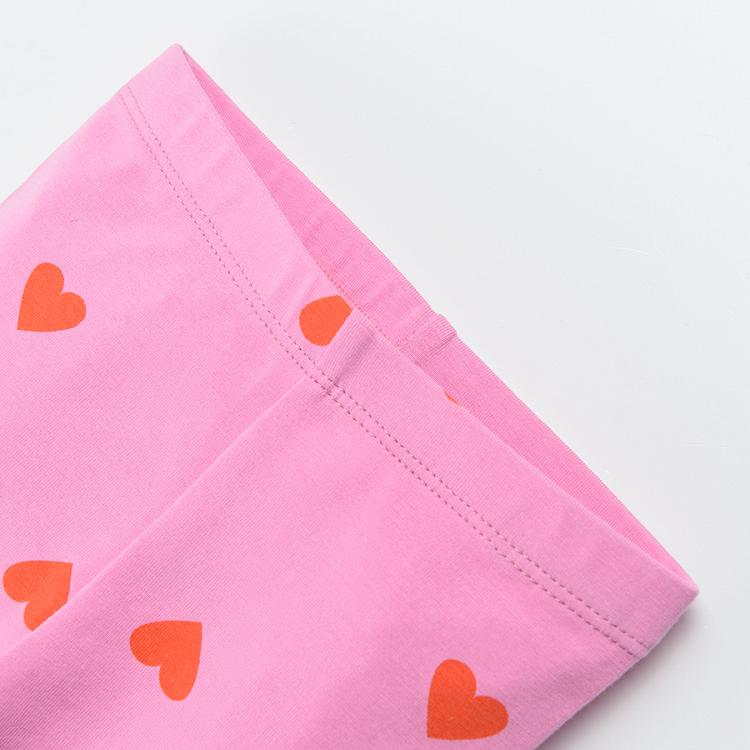 Pink leggings with hearts print