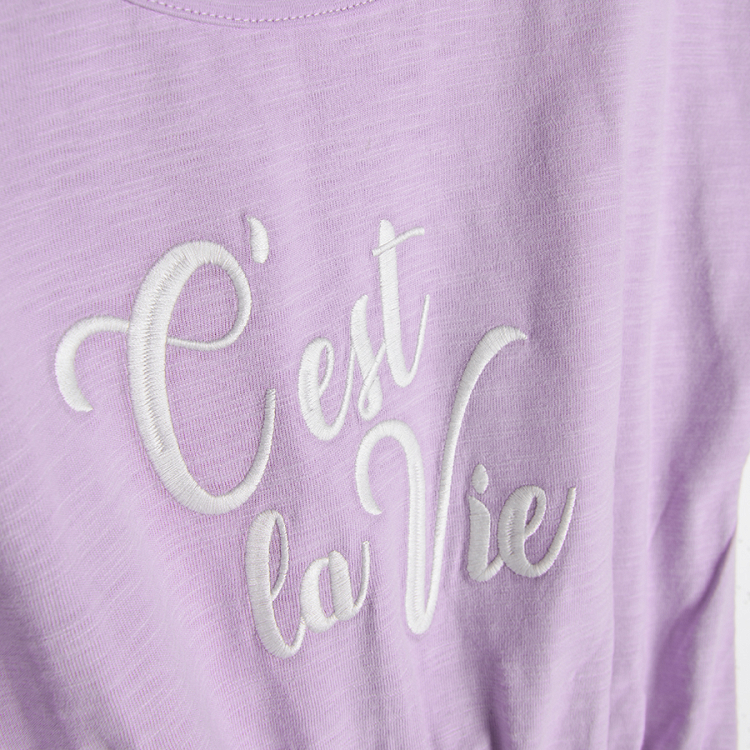 Purple sleeveless dress with CEST  LA VIE print