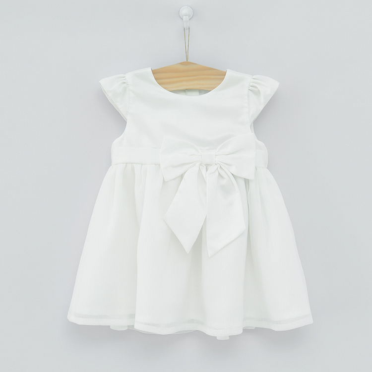 White short sleeve dress with a side bow