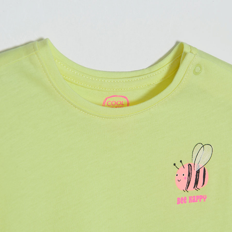 Yellow short sleeve T-shirt with poppers on the shoulder