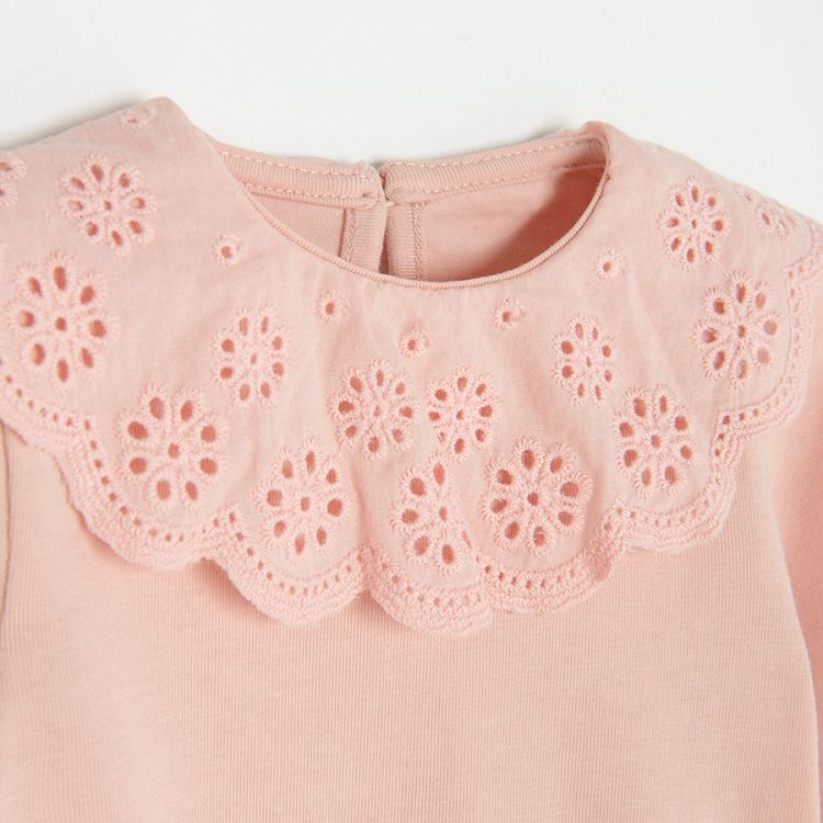 Light pink bodysuit with embroidered ruffle on the neckline