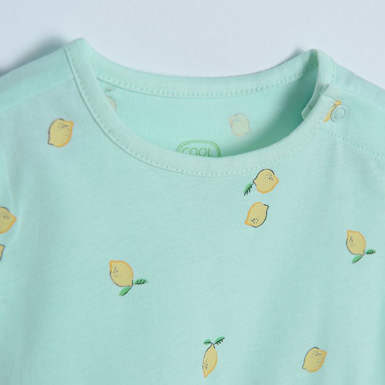 Light green summer dress with lemons print