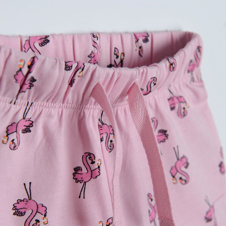 Pink shorts with flamingo print adjustabel waist and ruffle on the legs