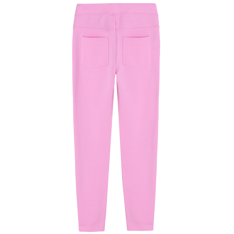 Pink jeggings with cats print on the knees