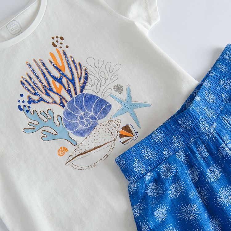 White short sleeve T-shirt with sea world print and blue trousers with white prints set