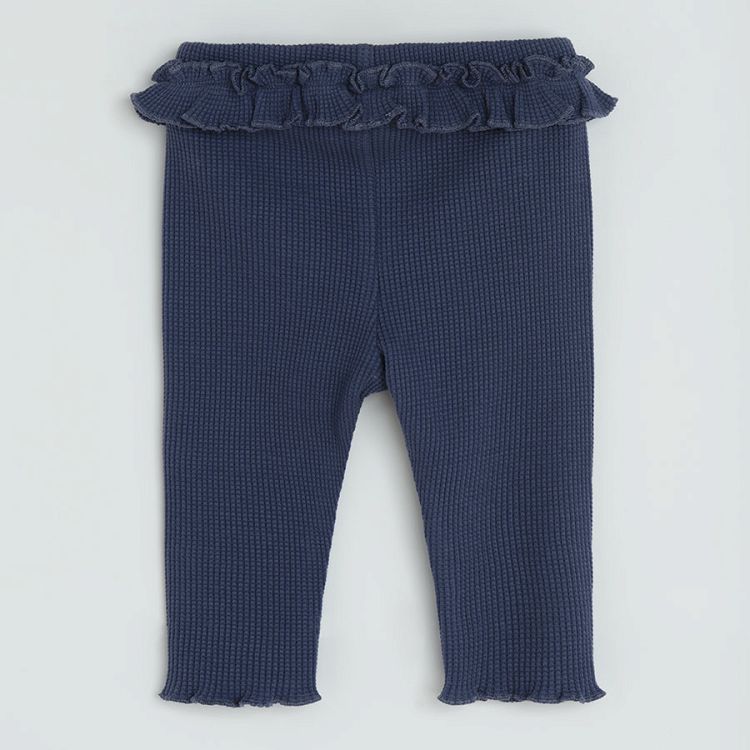 Blue jeggings with ruffle belt