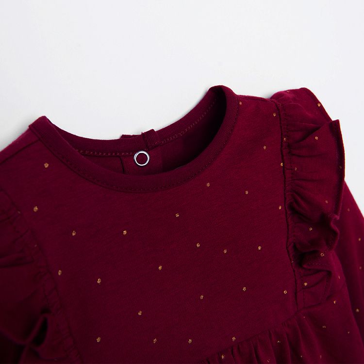 Burgundy polka dot long sleeve dress with ruffles on the shoulders