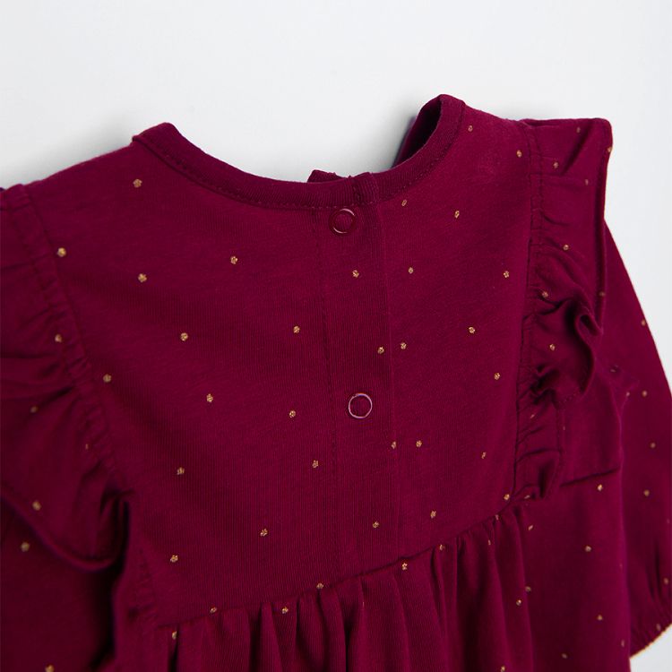 Burgundy polka dot long sleeve dress with ruffles on the shoulders