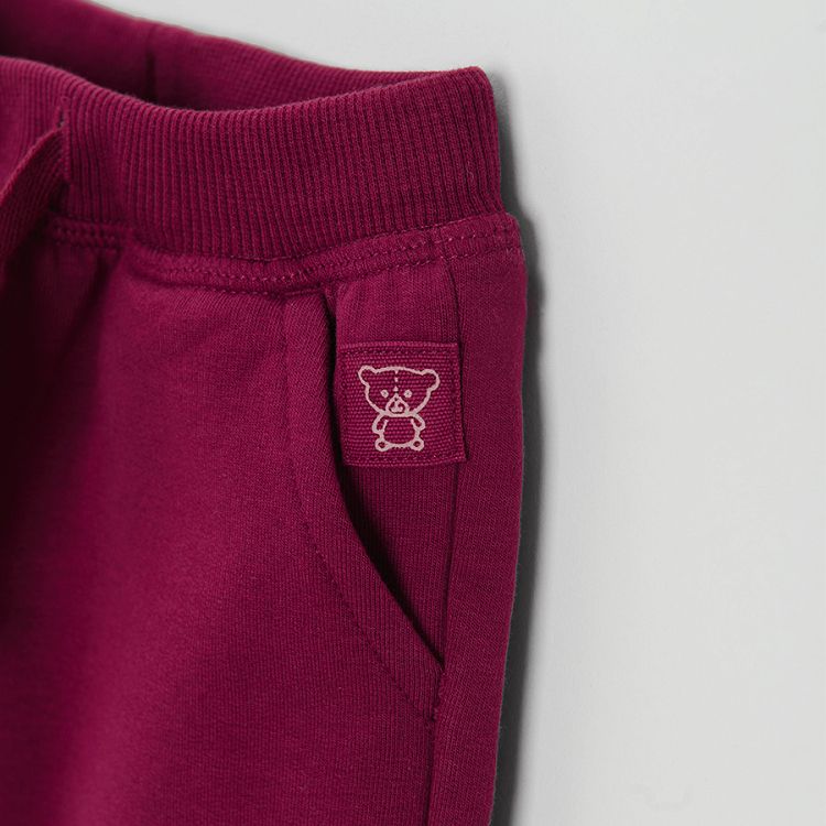 Burgundy jogging pants with fox print