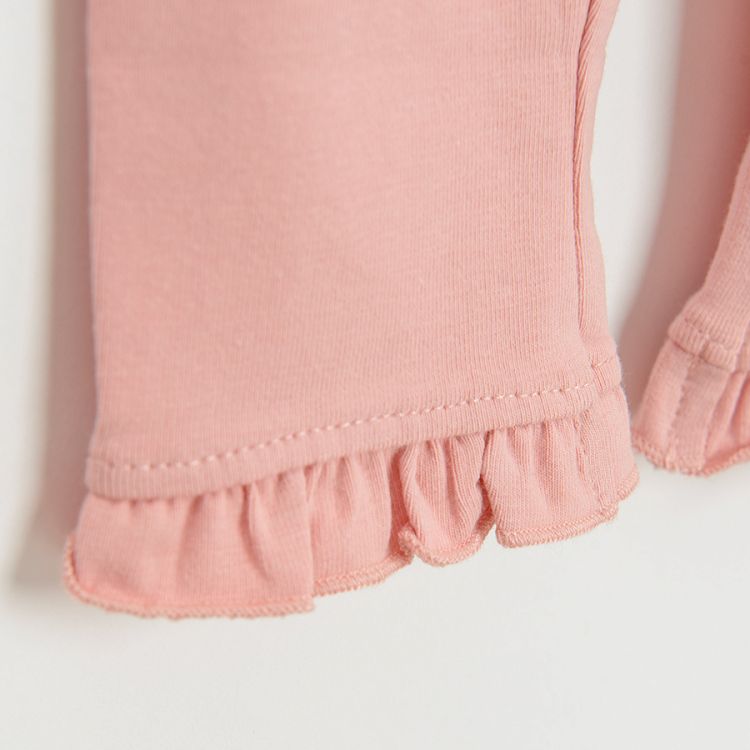 Dusty pink leggings with ruffle at the bottom