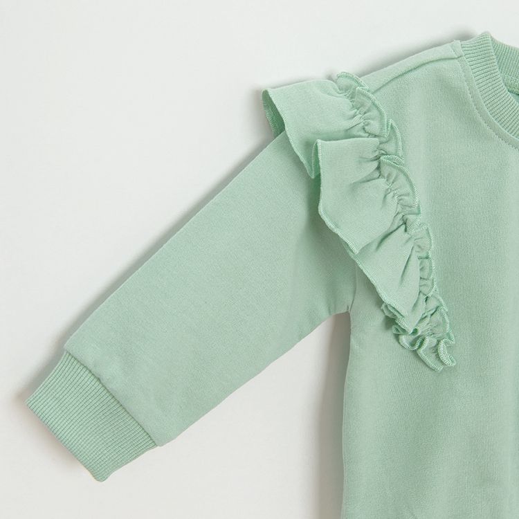 Teal sweatershirt with ruffles on the arms and floral leggings clothing set