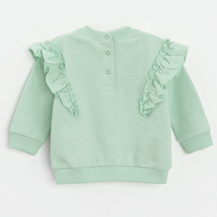 Teal sweatershirt with ruffles on the arms and floral leggings clothing set