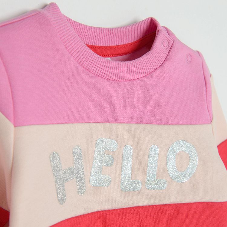 Pink, orange, white sweatshirt with HELLO print