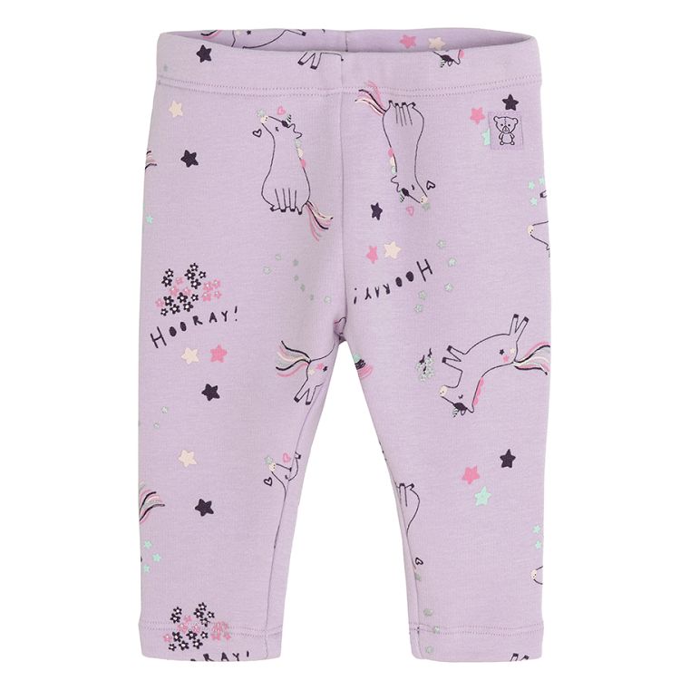 Purple leggings with unicorns print