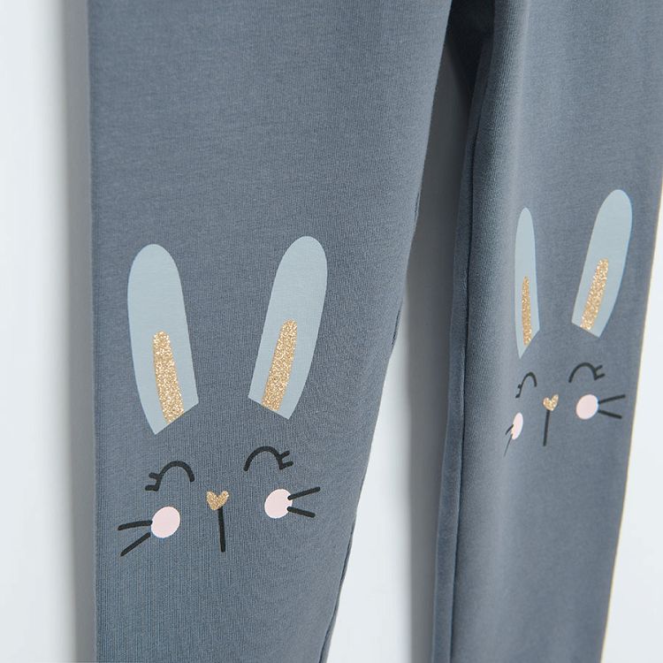 Blue leggings with bunnies print on the knees