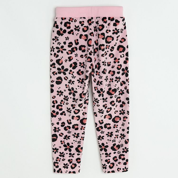 Pink jogging pants with flowers print