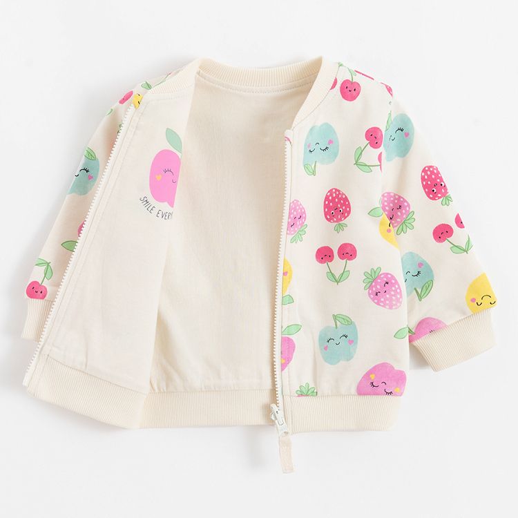 White sweatshirt with fruit print and purple reversible sweatshirt