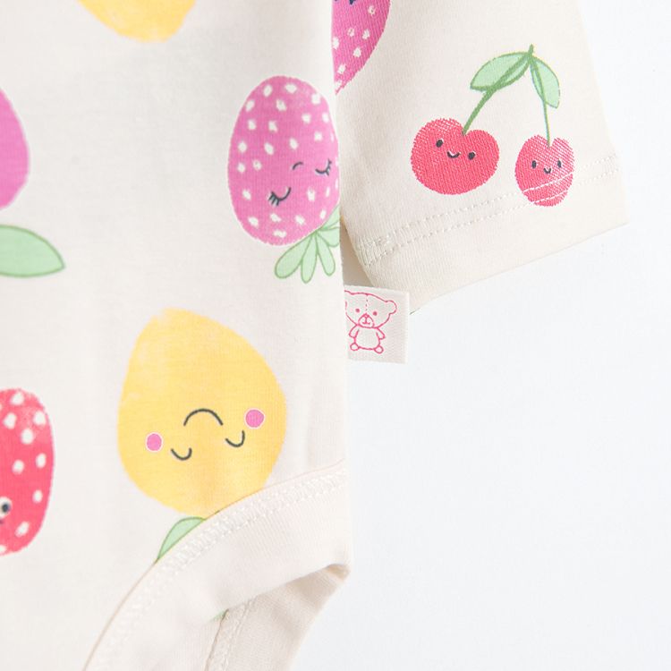 White long sleeve bodysuit with fruit print