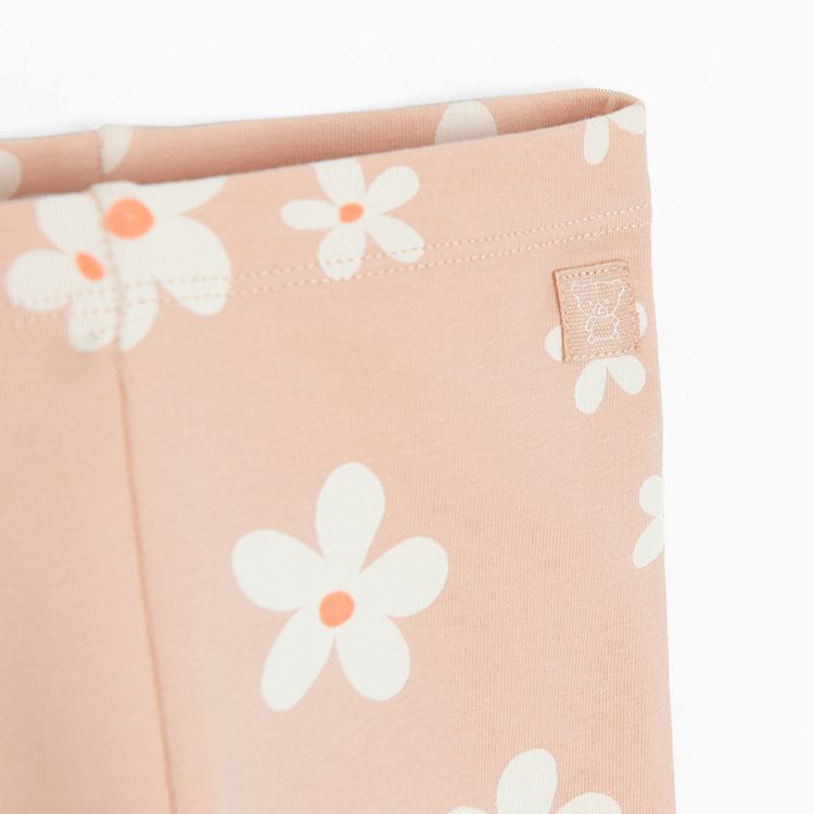 Light pink leggins with daisies print