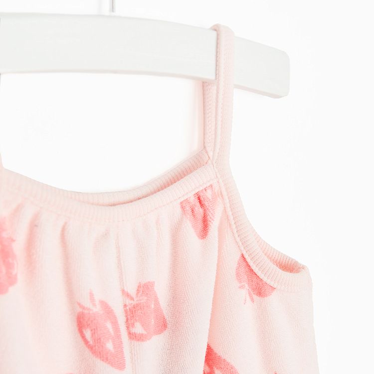 Pink romper with straps and strawberries print