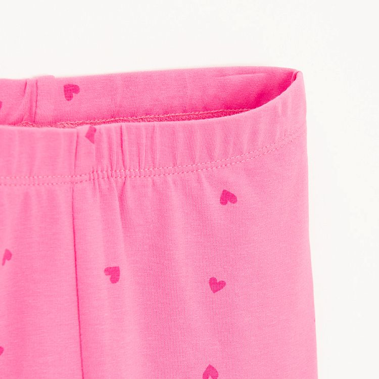 Pink leggings with red hearts print