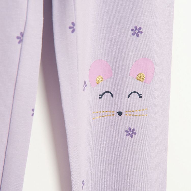 Purple leggings with kitten face print on knees